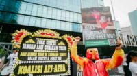 Fore Coffee Tolak Transisi Cage-Free, Koalisi AFJ–AFFA Kirim Karangan Bunga Duka Cita Sebagai Simbol Keprihatinan1
